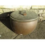 A substantial Georgian copper cauldron of circular form complete with cover and iron swing handle