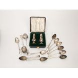 A cased pair of pepper pots and various silver spoons, etc, 6 oz