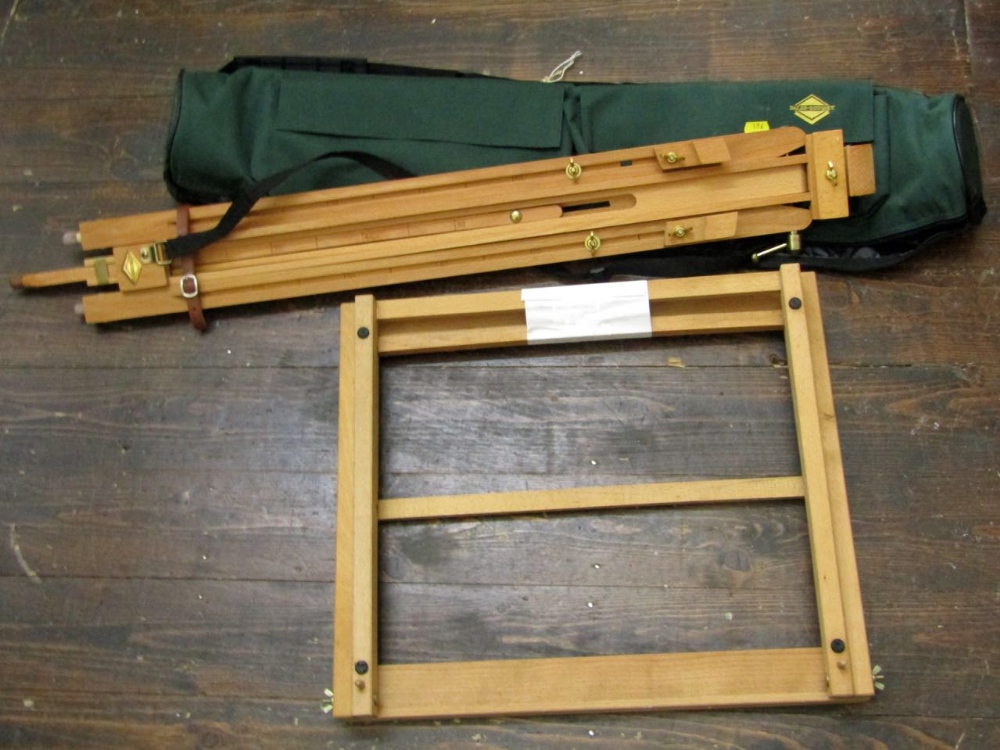 A Daler Rowney adjustable easel in carrying case together with a further adjustable desk top easel