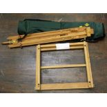 A Daler Rowney adjustable easel in carrying case together with a further adjustable desk top easel