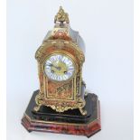 Good French Boulle work mantle clock with two train gilt dial fitted with enamel Roman numerals, the