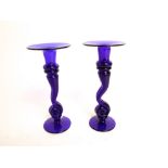 Pair of Bristol blue glass candlesticks on stylized columns