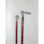 Interesting striped exotic hardwood walking stick, with cast pewter rabbit head and knop; together