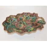 An unusual Belgian art pottery single handled dish of leaf shaped form with shaped rim and