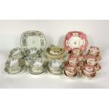 A collection of early Victorian tea wares with painted floral sprays on a pink and gilt ground,