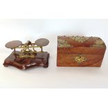 19th century walnut and brass strap work tea caddy; together with a set of 19th century postal