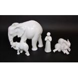 A white glazed Royal Doulton figure of an elephant with its young from the Images of Nature series -