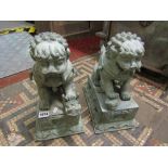 A pair of very weathered Chinese bronze dogs of Fo, 30cm long