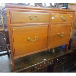 A contemporary Chinese hardwood chest of four drawers, the two lower deep drawers with divided