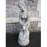 A reconstituted weathered garden ornament in the form of a classical female, 80cm tall