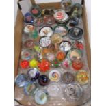 An extensive collection of glass paperweights to include many Millefiori examples and other souvenir