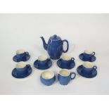 A six place Moorcroft coffee set with blue speckled glaze finish comprising coffee pot, cream jug,