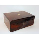 19th century rosewood sewing box, the hinged lid enclosing a silk fitted interior, 28 cm long