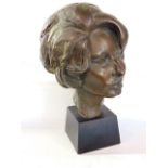 A cast bronze bust of Sophia Loren, signed Jordan, limited edition 1/5 upon a square black slate