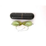 Pair of vintage sunglasses with chrome frames with original casework