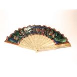 Good 19th century pierced and hand painted ivory brisé fan, painted with figures in a garden