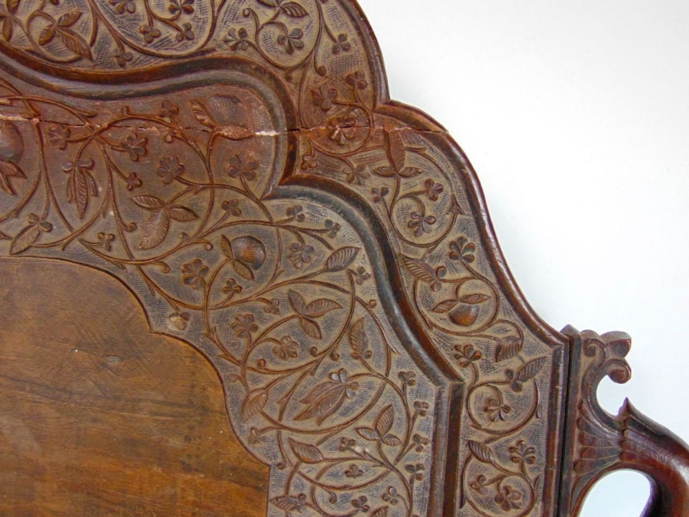 A carved eastern hardwood twin handled gallery tray with serpentine type frame, carved with scrolled - Image 2 of 3