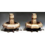 Two interesting antique eastern copper brass and silver inlaid candlesticks, the faceted tapered