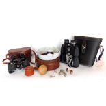 Two vintage cased sets of binoculars and a collar box, fitted with further smaller items to