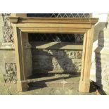 A reclaimed stripped pine fire surround with stepped and moulded detail, mantle 166 cm wide,