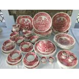 A collection of Copeland Spode Tower pattern dinner and tea wares in the pink colourway comprising