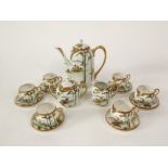 A six place Japanese eggshell porcelain coffee service with painted and gilded bamboo decoration,