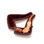 Meerschaum cheroot holder, a clasped hand grasping a torch, AF with original casework