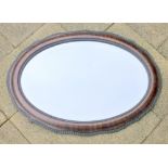 VICTORIAN WALNUT HANGING MIRROR WITH OVAL BEVELLED GLASS (89 cm x 63 cm)