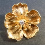 TORMOS YELLOW METAL FLORAL BROOCH SET DIAMOND, STAMPED 585 (6.9g)