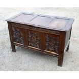 LATE C17th AND LATER OAK CHEST WITH A TRIPLE CARVED PANELLED FRONT AND PANELLED TOP ON STILE