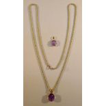 9ct GOLD AMETHYST PENDANT ON GILT CHAIN, A 9ct GOLD AMETHYST PENDANT AND A GOLD RING SET AMETHYST,