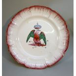 LATE C19th FRENCH FAIENCE OCTAFOIL PLATE PAINTED WITH A RED AND GREEN EAGLE WITH CROWN ABOVE, WITHIN