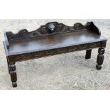 ANGLO FLEMISH CARVED OAK HALL SEAT (57.5 cm x 122 cm x 35.5 cm)