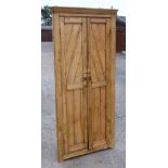 ARTS AND CRAFTS PINE CORNER CUPBOARD WITH TWO DOORS ENCLOSING SHELVES (192.5 cm x 89 cm x 42 cm)