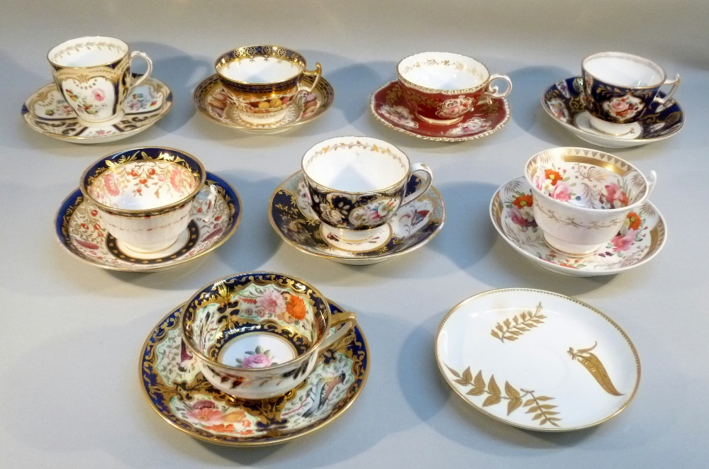 TWO LATER BONE CHINA BLUE AND GILT FLORAL PAINTED TEA CUPS AND SAUCERS, TWO COFFEE CUPS AND SAUCERS,