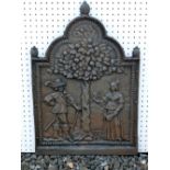 CAST IRON FIREBACK WITH A CAVALIER AND A LADY STANDING BENEATH AN APPLE TREE (75.5 cm x 51 cm)