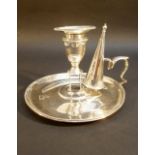 GEORGE III SILVER CHAMBERSTICK OF CIRCULAR FORM WITH FLARED BEADED RIM AND ENGRAVED DRAGON CREST, BY