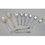 SET OF SIX SILVER COFFEE SPOONS, EACH WITH A BELLFLOWER DECORATED HANDLE, A PAIR OF TONGS,