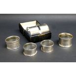 PAIR OF SILVER NAPKIN RINGS WITH VACANT CARTOUCHES, CHESTER 1926, CASED, A PAIR OF SILVER NAPKIN