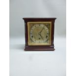 GEORGIAN STYLE MANTEL CLOCK WITH A BRASS DIAL ENCLOSING A THREE TRAIN CHIMING AND STRIKING EIGHT DAY