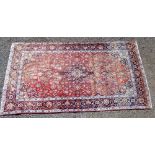 PERSIAN MADDERFIELD CARPET WITH A CENTRAL PENDANT MEDALLION AND ALL-OVER STYLIZED FLORAL