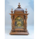 EARLY C20th MANTEL CLOCK WITH A DOME BRASS DIAL ENCLOSING A TWO TRAIN CHIMING AND STRIKING EIGHT