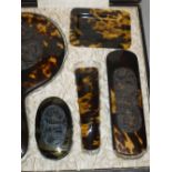 EARLY 20th CENTURY ORIENTAL TORTOISESHELL DRESSING TABLE SET COMPRISING A HAIRBRUSH, CLOTHES BRUSH