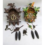 A BLACK FOREST CUCKOO CLOCK WITH WEIGHTS (H: 35.5 cm APPROX.) AND ANOTHER CUCKOO CLOCK [2]