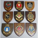 SEVEN NAVAL RELATED OAK ARMORIAL WALL PLAQUES COMPRISING 'H.M.S. COLOSSUS', 'H.M.S. COTSWOLD', '