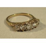 AN 18ct GOLD RING SET FIVE GRADUATED DIAMONDS 1½ct APPROX. (3g)