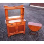 AN ARTS AND CRAFTS OAK DRESSER WITH A MIRROR BACK, TWO DRAWERS AND TWO PANELLED DOORS BELOW (168.5cm