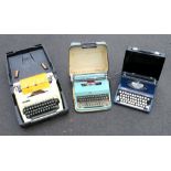 THREE MANUAL TYPEWRITERS COMPRISING A SILVER REED 'SILVERETTE', AN OLIVETTI 'LETTERA-32' AND AN