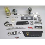 A VINTAGE AUTOMOBILIA LOT CONTAINING VARIOUS CAR EXTERIOR STYLING BADGES FROM THE 1970's/80's