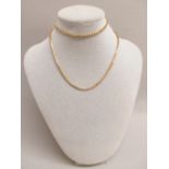 A GOLD BOX CHAIN NECKLACE STAMPED 10K, LENGTH 61 cm (17.8g)